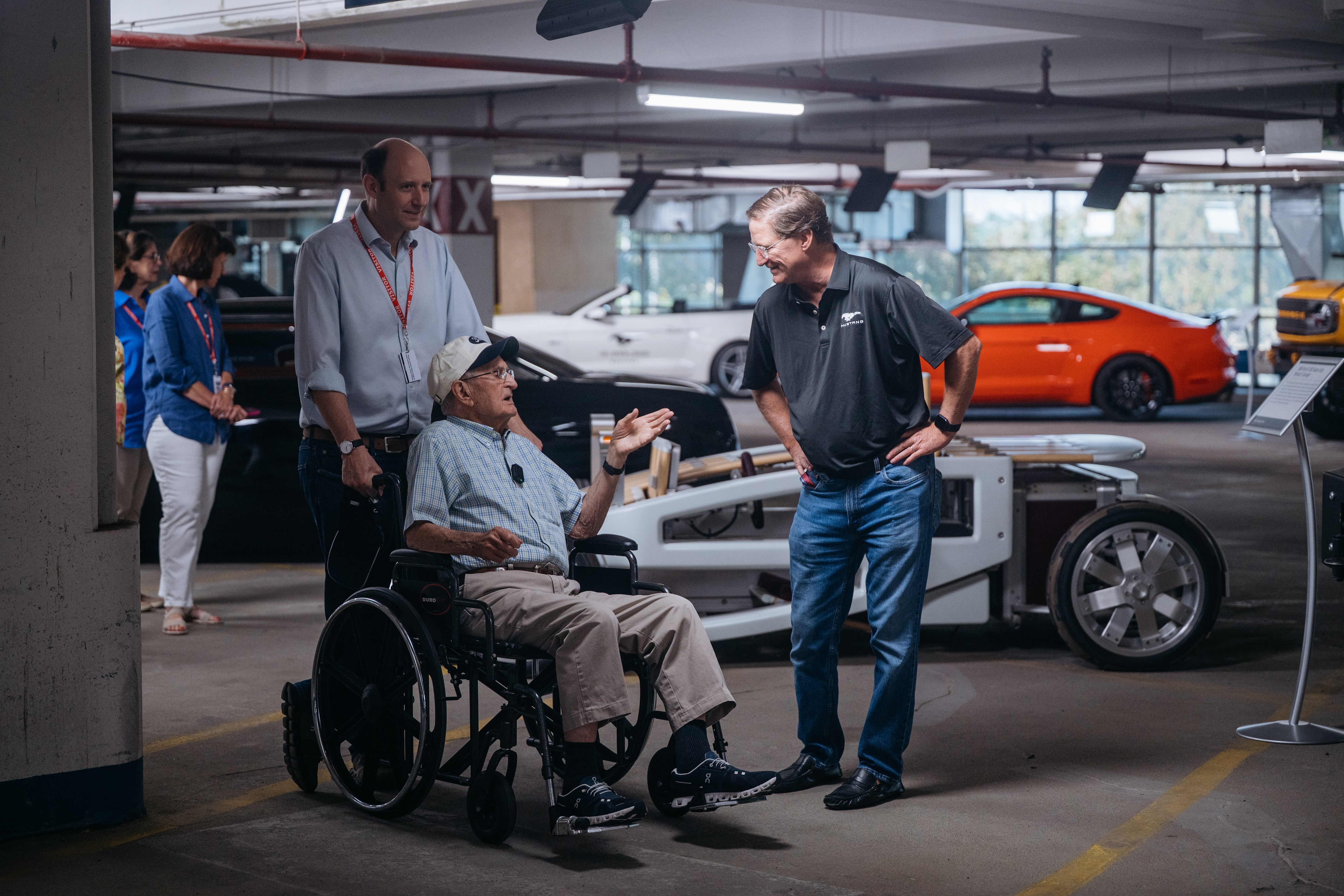 Bill McCubbin, a 102-year-old World War II veteran, marveled as he toured the Heritage Fleet of landmark Ford vehicles. 